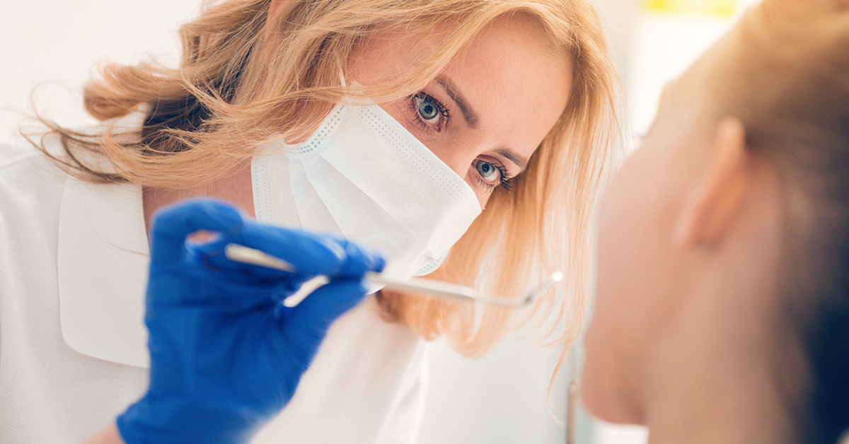 dentist caring for patient's gums
